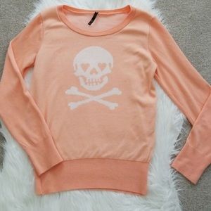 Orange skull sweater